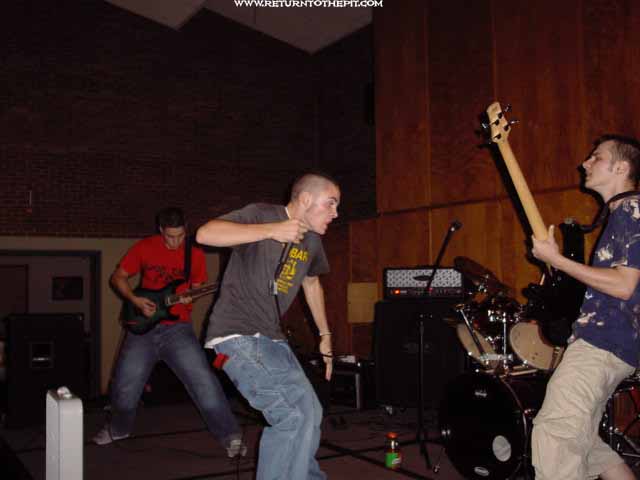 [held hostage on Sep 21, 2002 at Return to the Pit 6 year concert - Stratford Rm (Durham, NH)]